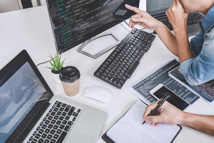 group working on coding project