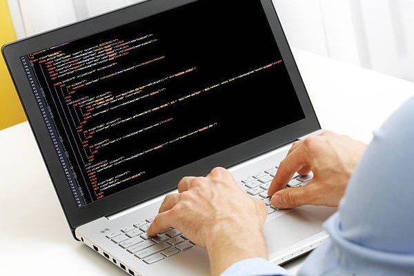 image of computer wiht code on it